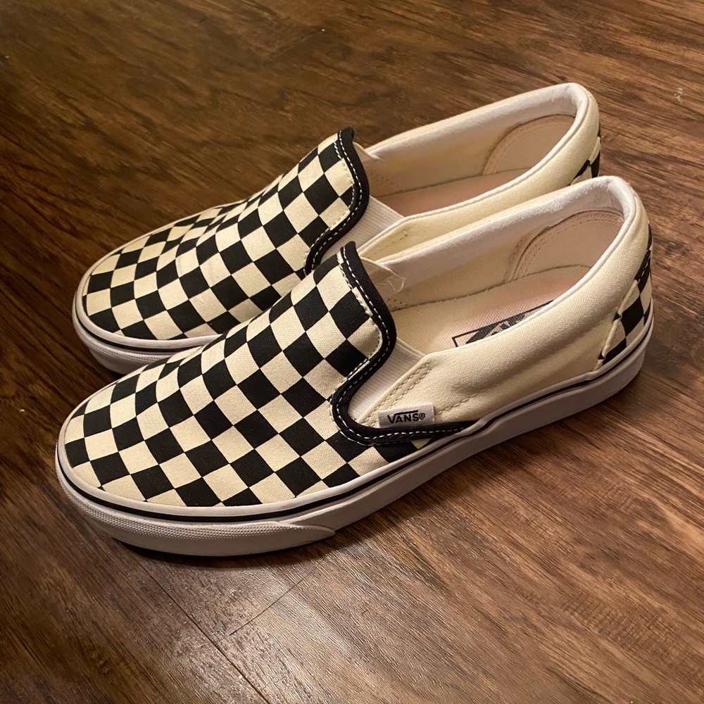 Black and white slip on vans barely worn